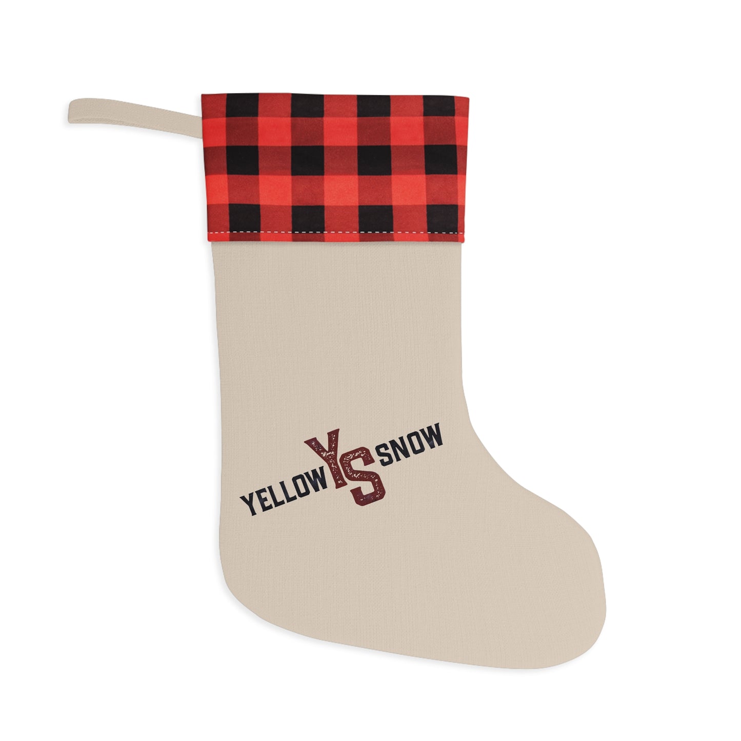 Beige Christmas stocking with red and black plaid top on a white background